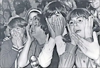  ?? Picture ?? Beatles fans react to seeing the band in the 1960s
Kevin Cole