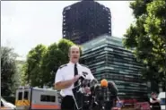  ?? VICTORIA JONES — PA VIA AP ?? Metropolit­an Police Commander Stuart Cundy speaks to the media near Grenfell Tower after a fire engulfed the 24-storey building, in London, Saturday. London police say 58 people who were in Grenfell Tower are still missing and assumed to be dead.