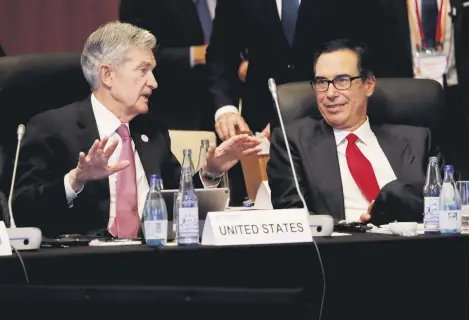  ??  ?? Federal Reserve Chairman Jerome Powell talks with U.S. Treasury Secretary Steven Mnuchin during the G-20 finance ministers and central bank governors meeting in Fukuoka, Japan June 8, 2019.