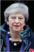  ??  ?? Senior sources say that Prime Minister Theresa May has secured concession­s from Brussels, with the EU agreeing to write an ‘all-UK’ customs union into the divorce deal. — AFP photoa