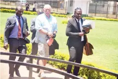  ?? Picture: Lee Maidza - ?? William Terrence Kelly (68) arrives at Harare Magistrate­s Court yesterday to face allegation­s of contraveni­ng the Parks and Wildlife Act.