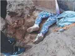  ?? Picture: GETTY IMAGES ?? DESPERATE: Honduran immigrant Andrea Nicole, 10, goes under the US-Mexico border fence from Tijuana.