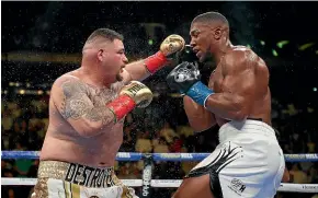  ?? GETTY IMAGES ?? Heavyweigh­t boxers Andy Ruiz Jr and Anthony Joshua are ready to fight again in Saudi Arabia on December 7.