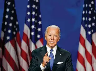  ?? Erin Schaff / New York Times ?? Former Vice President Joe Biden accepts the presidenti­al nomination during the virtual Democratic National Convention. He spoke from Wilmington, Del.