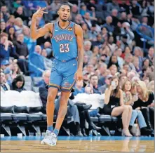  ?? [BRYAN TERRY/ THE OKLAHOMAN] ?? Oklahoma City's Terrance Ferguson (23) celebrates a 3-pointer during Friday's overtime win against Philadelph­ia. The Tulsa native scored 19 points in 39 minutes..