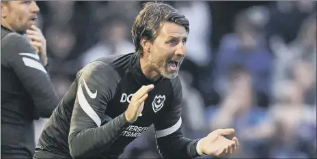  ?? Picture: Jason Brown ?? GOOD SHOUT Pompey head coach Danny Cowley urges his players on during the 1-0 win at home to Shrewsbury
