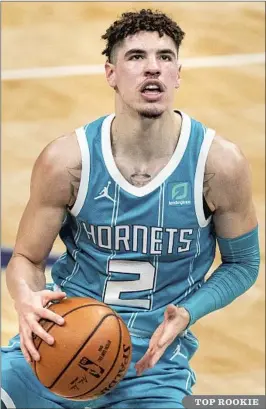  ?? Jacob Kupferman Associated Press ?? TOP ROOKIE
LaMELO BALL, just 19, has sparked Charlotte and leads all rookies in scoring (15.8), assists (6.4) and rebounds (6.0) and is fourth in the NBA in steals (1.6).