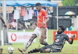  ?? Picture: SOPHIE RALULU ?? Rewa player Patrick Joseph, left, tussles with Ba’s Narend Rao during the Vodafone Fiji FACT at Subrail Park in Labasa yesterday.