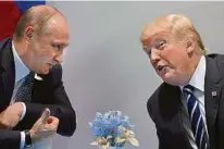  ?? APA ?? Putin und Trump bei ihrem ersten Treffen beim APEC-Gipfel 2017