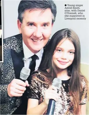  ?? Young singer Astrid Smith, nine, with Daniel O’Donnell, who she supported in Liverpool recently ??