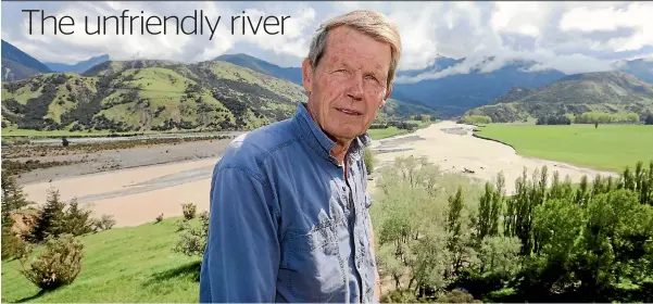  ?? PHOTO : SCOTT HAMMOND/ STUFF ?? Woodbank farmer John Murray with the new course of the Clarence River, eating through some of his best grazing land in the background.