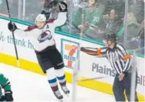  ?? Brandon Wade, The Associated Press ?? Nathan MacKinnon celebrates his 19th goal of the season, which came Saturday night in the third period of the Avs’ 4-1 win over the Stars in Dallas.