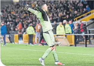  ??  ?? East Fife keeper Brett Long celebrates his side’s winning goal, leading to a red card from the referee