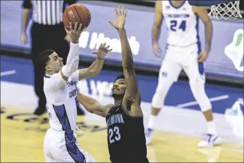  ?? ASSOCIATED PRESS ?? CREIGHTON GUARD MARCUS ZEGAROWSKI (11) makes a layup against Villanova forward Jermaine Samuels (23) in the first half during a game Saturday in Omaha, Neb.