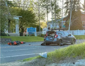  ?? RICH ROLEN/SPECIAL TO THE MORNING CALL ?? Police investigat­e a fatal crash involving a motorcycle and another vehicle Thursday on Route 248 near the 25th Street Shopping Center.