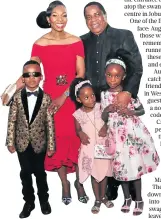  ??  ?? Portia Gumede with hubby Robert Gumede and their kids, Keni, Matana and Natana.