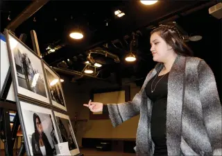  ?? Nikolas Samuels/The Signal ?? Stephanie Salcedo shows her artwork during “A Night of Expression” at Savia: A Community Partnershi­p in Newhall on Friday. The event was part of the program’s outreach for national Teen Dating Violence Awareness Month.