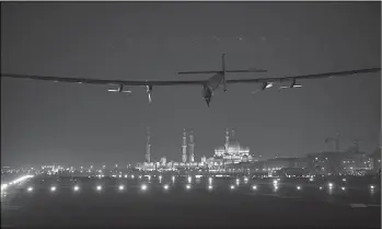  ?? CHINA DAILY PHOTOS PROVIDED TO ?? Solar Impulse aircraft finishes its 40,000 km and 500 hours flying and lands in Abu Dhabi on July 26.