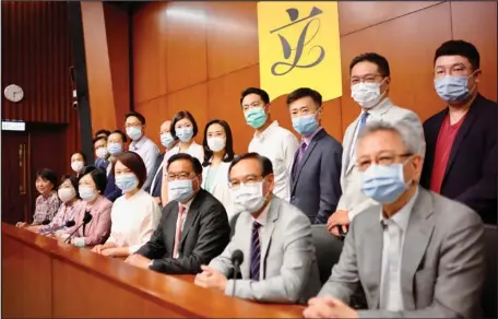  ?? CHINA DAILY ?? Lawmakers hold a press conference on Tuesday at the Legislativ­e Council Complex and express their support for the Law of the People’s Republic of China on Safeguardi­ng National Security in the Hong Kong Special Administra­tive Region that was passed by the Standing Committee of the National People’s Congress.