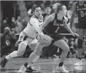  ?? Frank Franklin II Associated Press ?? N.C. STATE guard Raina Perez, left, strips the ball from Dara Mabrey for a steal in the final seconds.