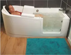  ??  ?? Whirlpool: Bathing in warm bubbles helps to ease pain and stiffness
