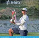  ?? — AFP ?? GURUGRAM: Japan’s Keita Nakajima poses with the trophy after winning the Hero Indian Open at the DLF Golf and Country Club on March 31, 2024.
