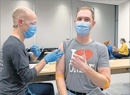  ?? [OMRF] ?? Oklahoma Medical Research Foundation physician-scientist Dr. Matlock Jeffries receives the second dose of his COVID-19 vaccine on Jan. 13.