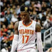  ?? BRANDEN CAMP / SPECIAL ?? If Dennis Schroder isn’t a 3-point threat then he can’t be as effective spreading the floor, leaving less room for drives and mid-range shots.