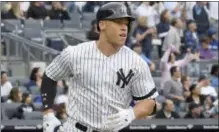  ?? BILL KOSTROUN — THE ASSOCIATED PRESS ?? New York Yankees’ Aaron Judge rounds the bases with a home run during the fourth inning of a baseball game against the Toronto Blue Jays, Saturday, at Yankee Stadium in New York.