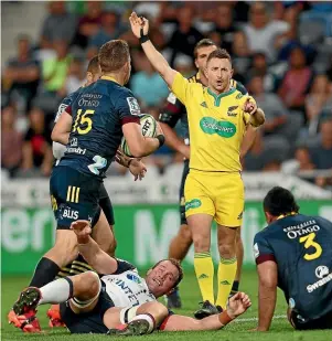 ?? GETTY IMAGES ?? Referee Paul Williams, here officiatin­g during the Highlander­s-Rebels game earlier this year, was quick to punish offending teams during the opening round of Super Rugby Aotearoa last weekend.