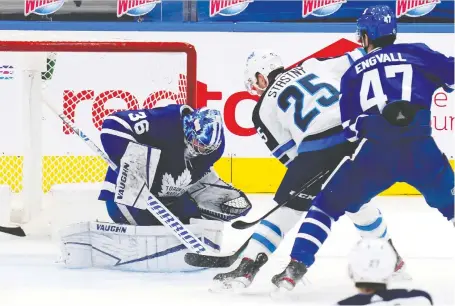  ?? JOHN E. SOKOLOWSKI/USA TODAY SPORTS ?? Winnipeg Jets forward Paul Stastny looks for a rebound on Maple Leafs goaltender Jack Campbell on Thursday night in Toronto. The Jets won 5-2 in a game that looked more like a pre-season contest than a preview of the North final, writes Michael Traikos.