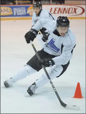  ?? JASON MALLOY – CHARLOTTET­OWN GUARDIAN ?? Jared McIsaac, from Truro and a member of the Halifax Mooseheads, runs a drill Monday in Charlottet­own in preparatio­n for tonight’s game five of the CIBC Canada Russia Series.