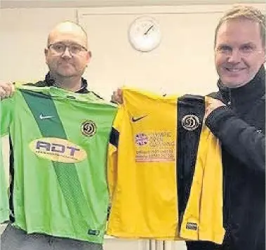  ??  ?? Pictured is Stuart Busby (left) and Graham Herring (right) with kits that are going to be donated by Loughborou­gh Dynamo to the ‘Kits for Africa’ appeal.