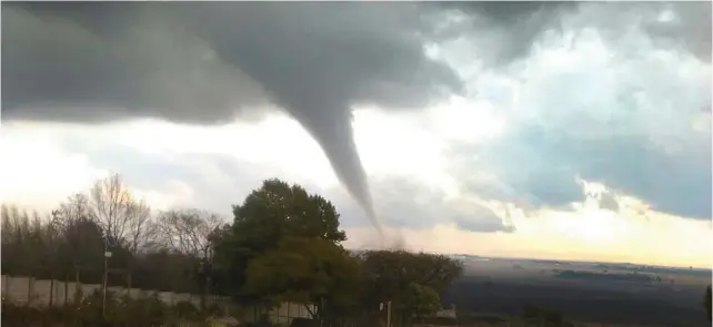  ??  ?? DAMAGING: Tornado which battered the country’s manufactur­ing hub of Ekurhuleni in July last year. At least 20 people were injured as debris was whipped into the air.