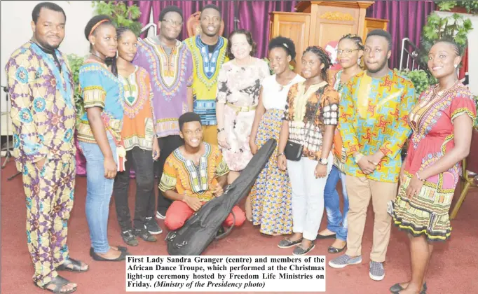  ?? (Ministry of the Presidency photo) ?? First Lady Sandra Granger (centre) and members of the African Dance Troupe, which performed at the Christmas light-up ceremony hosted by Freedom Life Ministries on Friday.