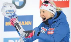  ?? Picture: Getty. ?? Finnish biathlete Kaisa Makarainen celebrates success, but most Finns in general are happy with their lot.
