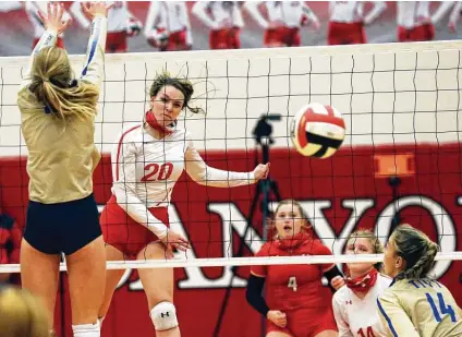  ?? Photos by Tom Reel / Staff photograph­er ?? New Braunfels Canyon junior outside hitter Kyla Malone puts away one of her team-high eight kills Tuesday night.