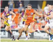  ?? Picture: RICHARD GOSLING ?? Jarrod Harbrow gets a kick away at Metricon Stadium in 2015.