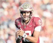  ?? MELINA MYERS USA TODAY NETWORK ?? Quarterbac­k Jordan Travis has passed for 2,469 yard and 19 touchdowns this year for the undefeated No. 4-ranked Seminoles, and has rushed for seven more TDs.