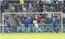  ?? ?? Joël Piroe scores Swansea’s second goal. Photograph: Gareth Everett/Huw Evans/ Shuttersto­ck