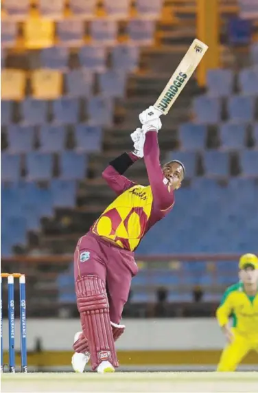  ?? Associated Press ?? Shimron Hetmyer of West Indies plays a shot against Australia during their second T20 match on Saturday.