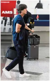  ??  ?? Unbearable: Germany’s Niklas Suele (left) reacting next to South Korea’s players after the Group F match at the Kazan Arena on Wednesday. Inset: Germany coach Joachim Loew passing through a security checkpoint at the Vnukuvo Airport in Moscow yesterday. — AFP / Reuters