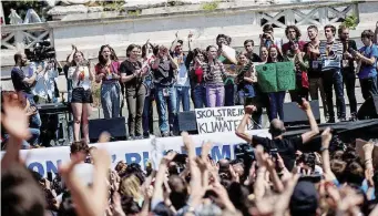  ?? LaPresse ?? “Con Greta salviamo il pianeta” La manifestaz­ione di ieri in piazza del Popolo, Roma