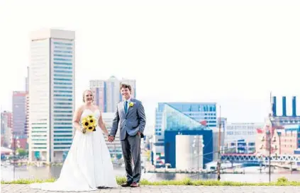  ?? MARIA LINZ PHOTOGRAPH­Y ?? Jennifer Cox and Daniel LaHatte, shown atop Federal Hill, had their ceremony at Holy Cross Roman Catholic Church. Just wedded? Or planning your nuptials? Tell us about it. Email your wedding details and contact informatio­n to weddings@baltsun.com. For...