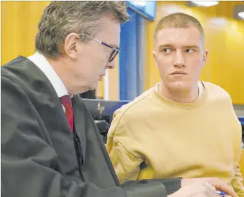  ?? Gorm Kallestad The Associated Press ?? Former member of the Russian private military contractor Wagner Group Andrey Medvedev, right, listens to his lawyer during a hearing in Oslo, Norway, on April 25.