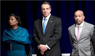  ?? HANS PENNINK — THE ASSOCIATED PRESS ?? New York Senate Majority Leader Andrea Stewart-Cousins (from left), Gov. Andrew Cuomo and Assembly Speaker Carl Heastie are seen Jan. 8, 2020, before Cuomo delivered his State of the State address at the Empire State Plaza Convention Center in Albany, N.Y.