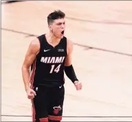  ?? Mark J. Terrill / Associated Press ?? Heat guard Tyler Herro celebrates a basket against the Celtics in Game 4 on Wednesday.