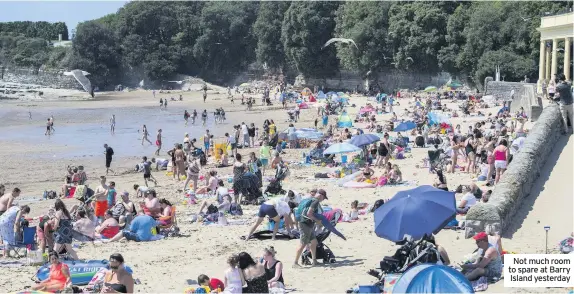  ??  ?? Not much room to spare at Barry Island yesterday