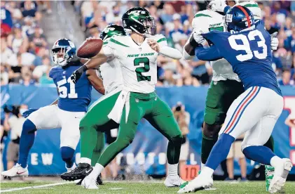  ?? ADAM HUNGER/AP ?? Jets rookie quarterbac­k Zach Wilson, the No. 2 overall pick in the draft, was 6 of 9 for 63 yards in his preseason debut Saturday night.