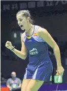  ??  ?? Carolina Marin celebrates a point.